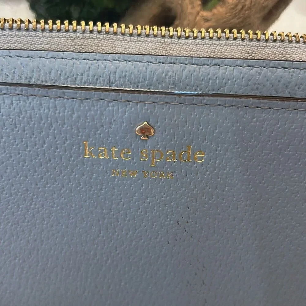 Kate spade blush wallet.